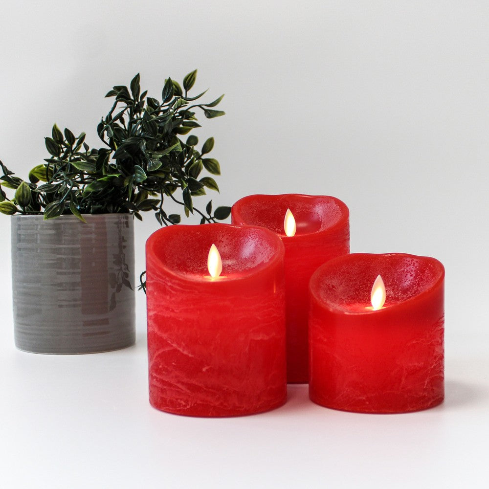 LED Bloklys med bevægelig flamme, rød, 3 stk, Ø10cm, inkl. fjernbetjening og timer, højde varierende fra 10cm til 15cm, ægte stearin