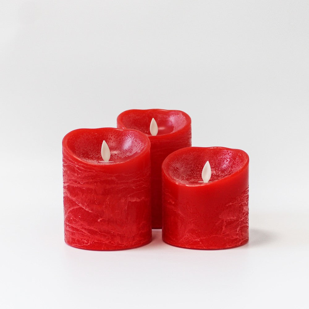 LED Bloklys med bevægelig flamme, rød, 3 stk, Ø10cm, inkl. fjernbetjening og timer, højde varierende fra 10cm til 15cm, ægte stearin