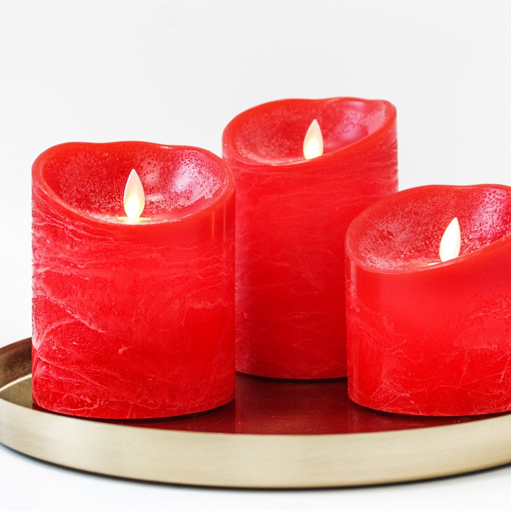 LED Bloklys med bevægelig flamme, rød, 3 stk, Ø10cm, inkl. fjernbetjening og timer, højde varierende fra 10cm til 15cm, ægte stearin