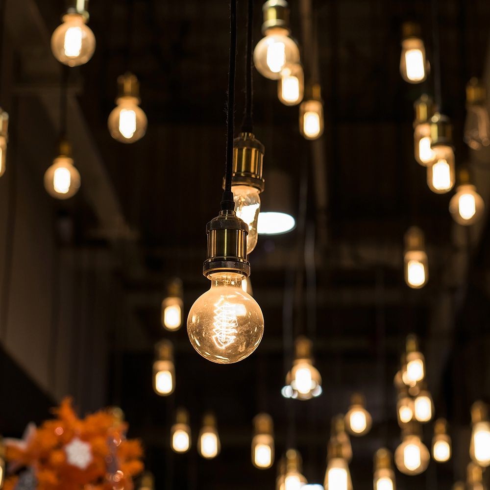 G125 LED pære - 6W, dobbelt spiral, kultråd, amber glas, 1800K, E27, 400lm, RA80