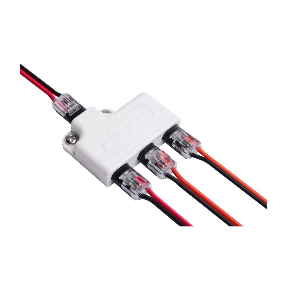 IDC 3-vejs splitter - IP20, 5V-36V, 6A - Strømfordeler til op til 3 enheder med beskyttelse mod støv og berøring. Kompatibel med spændinger mellem 5V og 36V og kan håndtere en strømstyrke på op til 6A.