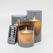 LED Bloklys i røgfarvet glas Ø7,5cm, 3 stk, flammeeffekt - m. fjernbetjening & timer, højde 10/12,5/15cm, ægte stearin